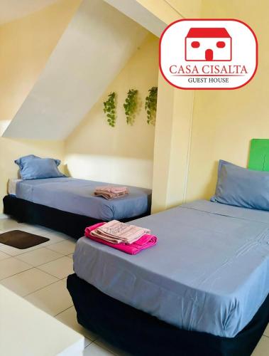 Postel nebo postele na pokoji v ubytování Casa Cisalta N4 - Quarto Compartilhado