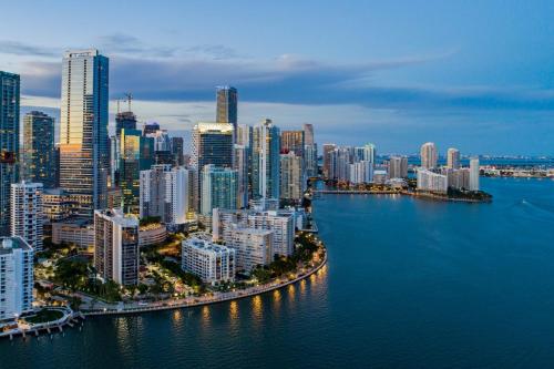 an aerial view of a large city with buildings at Lux Aka Brickell Condo in Miami