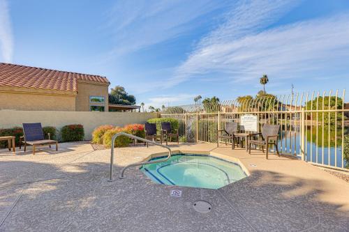 a hot tub in the middle of a patio at Half-Mi to Dtwn Lakefront Gilbert Home! in Gilbert