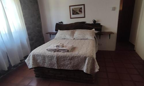 Postel nebo postele na pokoji v ubytování Cabañas La Morada