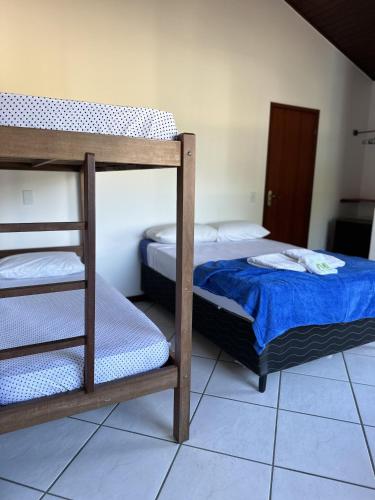 Postel nebo postele na pokoji v ubytování Pousada Encanto Torrely Búzios
