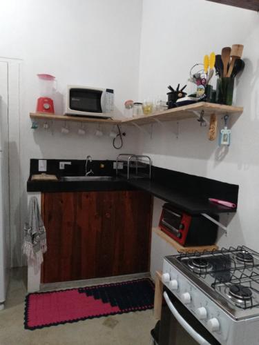 Η κουζίνα ή μικρή κουζίνα στο Chalé estrela guia