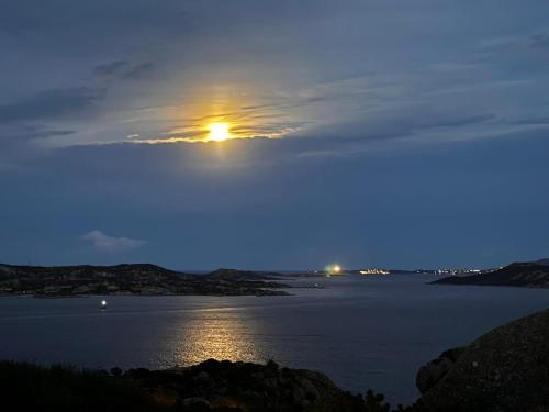 a view of a large body of water at night at Il Veliero in Porto Rafael