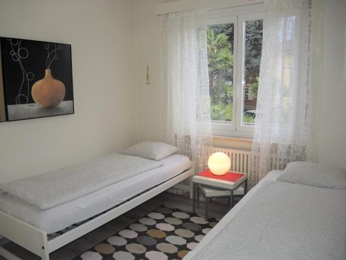 Ένα ή περισσότερα κρεβάτια σε δωμάτιο στο Violetta by Fewotessin