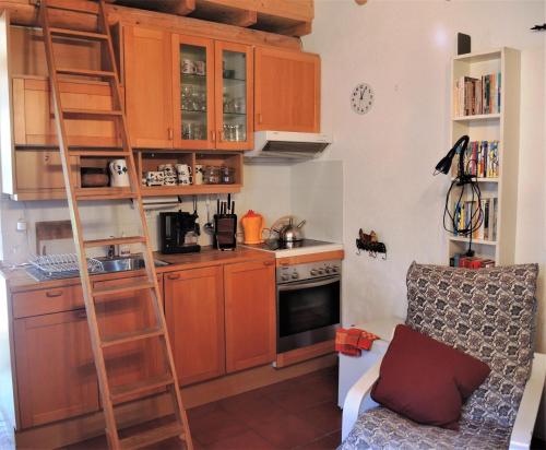 Una cocina o zona de cocina en Rustico Gatto & Topolino by Fewotessin