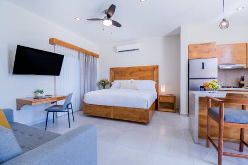 Postel nebo postele na pokoji v ubytování Josefa Suites