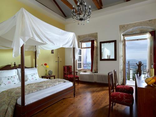 Postel nebo postele na pokoji v ubytování Villa Kerasia