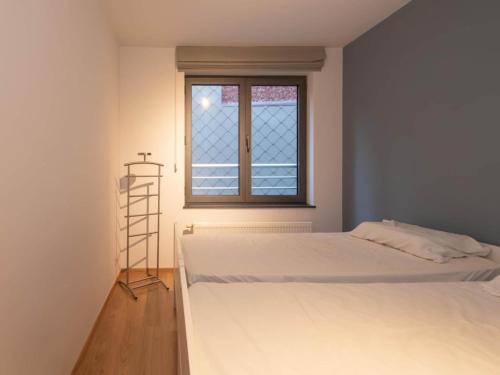 Postel nebo postele na pokoji v ubytování Apartment in Ostend near the Seafront