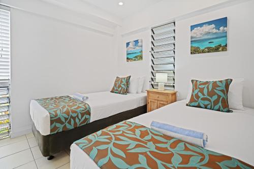 Ένα ή περισσότερα κρεβάτια σε δωμάτιο στο Ocean View Villas