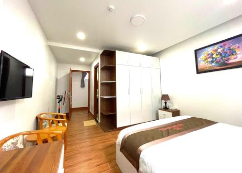 TV a/nebo společenská místnost v ubytování Anh Duc Hotel Da Lat City