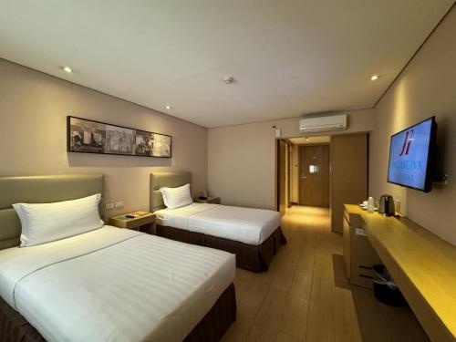 Télévision ou salle de divertissement dans l'établissement Jinjiang Inn - Ortigas