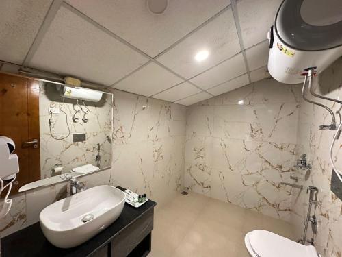 Ένα μπάνιο στο Luxe Haven Residency
