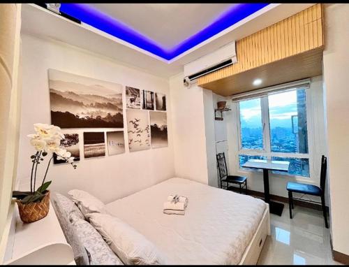 Postel nebo postele na pokoji v ubytování City View Suite