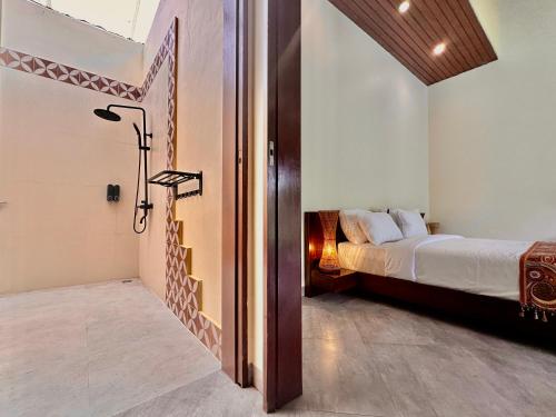 Postel nebo postele na pokoji v ubytování Sanur ocean view villas