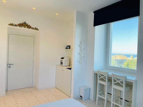 Postel nebo postele na pokoji v ubytování Casa Torre a Sorrento con parcheggio gratuito