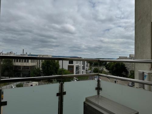 a view of a city from the balcony of a building at Premier Luxury Lazar Residence by TOD Apartments in Iaşi
