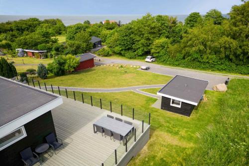 an aerial view of a house with a picnic table at Modern Holiday Home On Adventurous Bornholm in Allinge