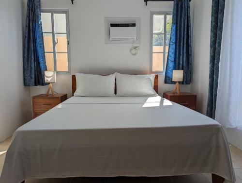 เตียงในห้องที่ Balay Hermosa