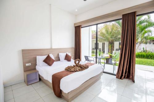 Katil atau katil-katil dalam bilik di Pondok Tetebatu Cottages and Cafe
