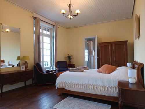 Ένα ή περισσότερα κρεβάτια σε δωμάτιο στο Maison Vive La Vie