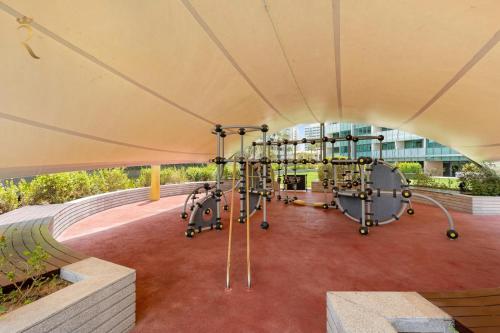 an image of a playground in a building at Oasis Stylish 2BR in Al Rahba - Modern Stay Near Al Raha Beach & Yas Island in Yas Island