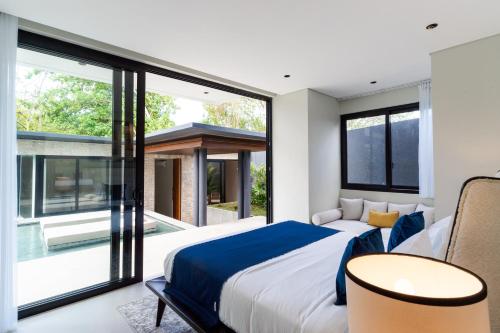 Postel nebo postele na pokoji v ubytování Dasi Villa Luxury 5 Bedroom Private Villa