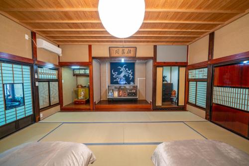 Una cama o camas en una habitación de アトリエFumi