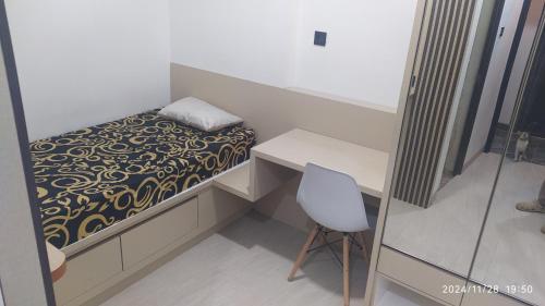 Postel nebo postele na pokoji v ubytování Graha Archiedena
