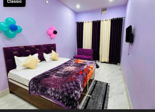 Postel nebo postele na pokoji v ubytování Hotel Sukoon