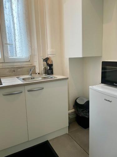 Photo de la galerie de l'établissement Charmant 2 pièces très bien situé proche du parc des princes, à Boulogne-Billancourt