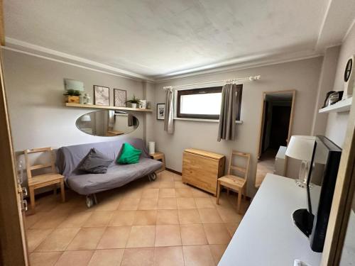 Ένα ή περισσότερα κρεβάτια σε δωμάτιο στο Brevi periodi Reggio Emilia