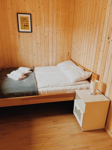 Postel nebo postele na pokoji v ubytování Osada Chmiel