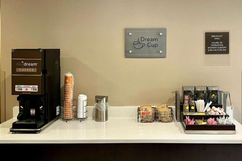 a counter top with a dream cupressoasteryasteryasteryasteryasteryasteryasteryastery at Sleep Inn Bessemer Helena in Bessemer
