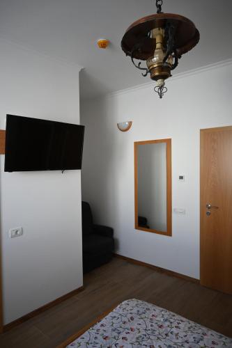 TV a/nebo společenská místnost v ubytování Cabana СUNTU