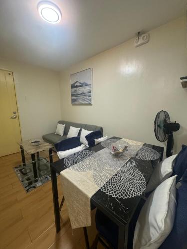 Zona d'estar a ELBIE Seawind Condominium