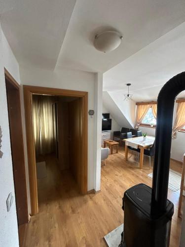 a view of a living room and dining room at Apartment Mila in Plitvička Jezera
