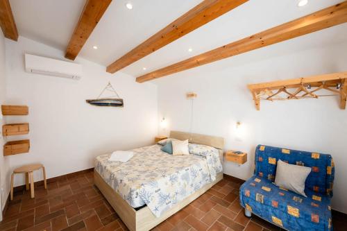 Katil atau katil-katil dalam bilik di Agriturismo Cupido