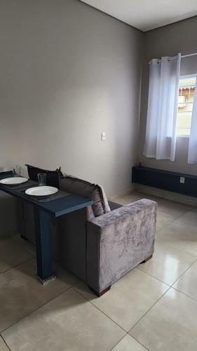 Χώρος καθιστικού στο Apartamento/Kitnet