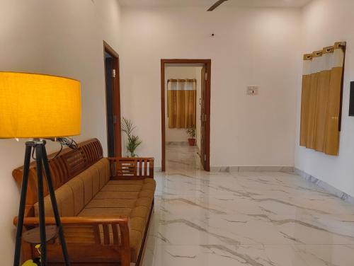 Posezení v ubytování EESHA Inn - A Premium Home stay Near Temple