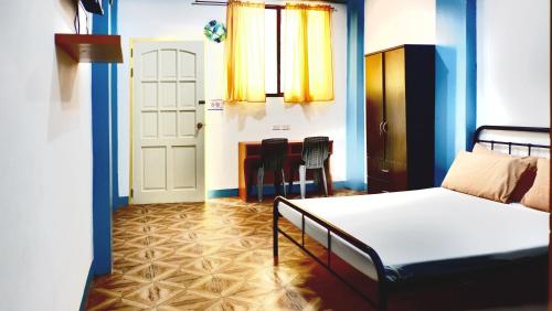 Postel nebo postele na pokoji v ubytování Mayas Guesthouse