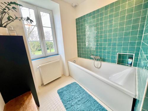 Koupelna v ubytování MAISON DE CAMPAGNE - Calme & Confort - Jardin Barbecue - Parking et Wifi Gratuit - ESPACE ET DETENTE - Idéal FAMILLE