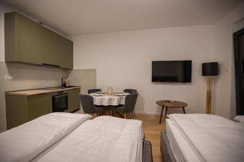 Postel nebo postele na pokoji v ubytování Central Suite