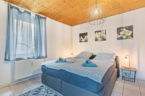 Postel nebo postele na pokoji v ubytování Ferienwohnung Faller