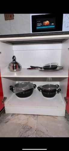Kuchyň nebo kuchyňský kout v ubytování Pathmark Homes Abuja