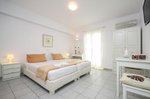 Letto o letti in una camera di Georgia Mare