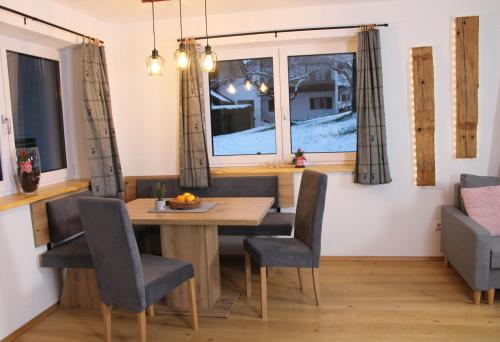 Posezení v ubytování Ferienwohnung Enzian