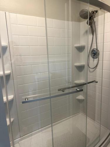 a shower stall with a glass shower door at 1 Ridgeway Avenue in Providence
