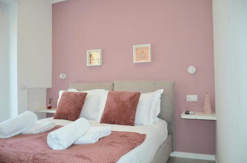 Postel nebo postele na pokoji v ubytování Vatican View Experience