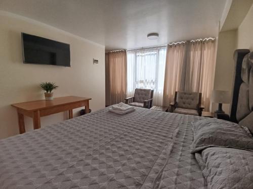 Postel nebo postele na pokoji v ubytování casa SKALA