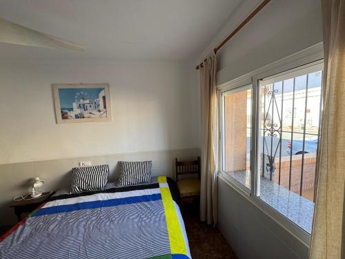 Postel nebo postele na pokoji v ubytování Beach House in Puntas de Calnegre